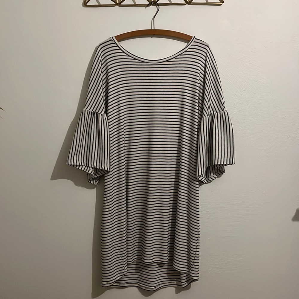 Black and white striped 3/4 length sleeve dress in a size M.